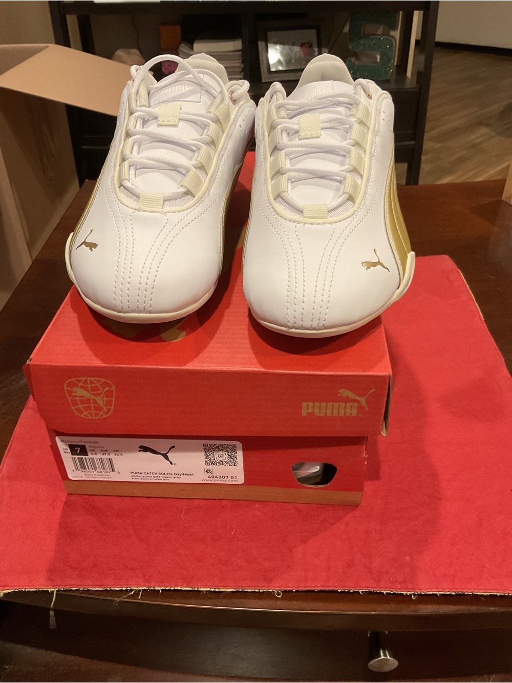 Puma White Sneakers with Gold Accents